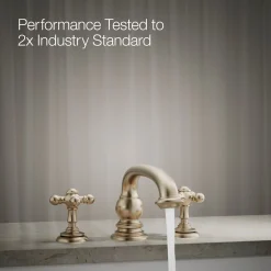 Deck-mount bath faucet handle trim with Cross design^Kohler