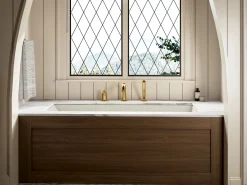 Deck-mount bath faucet with handshower^Kohler