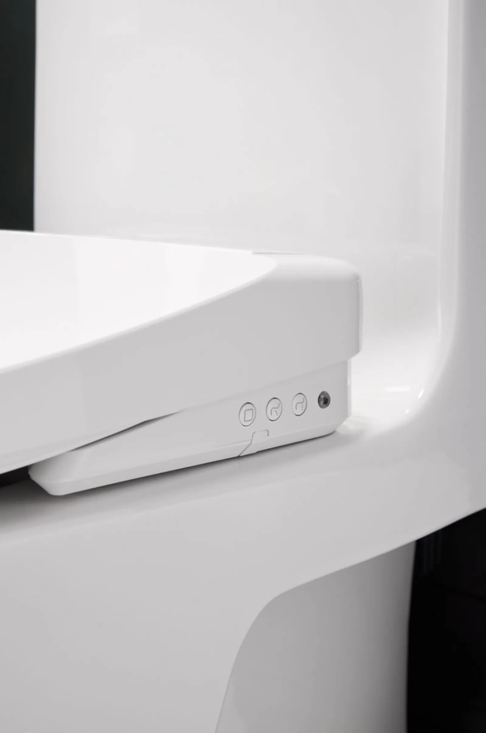 Elongated bidet toilet seat with remote control^Kohler Hot