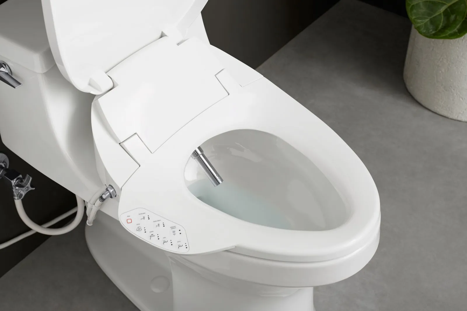 Elongated bidet toilet seat with remote control^Kohler