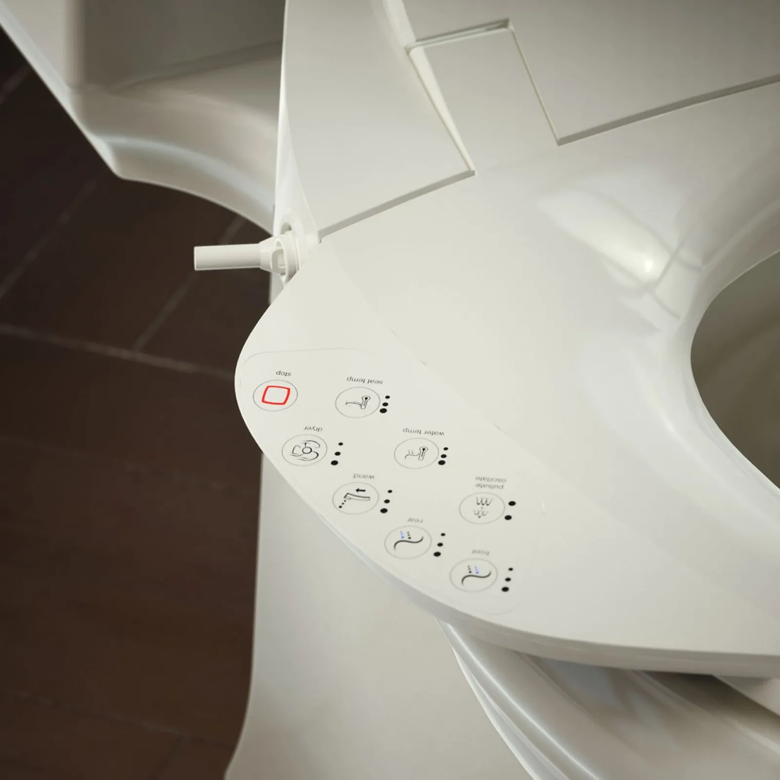 Elongated bidet toilet seat with remote control^Kohler