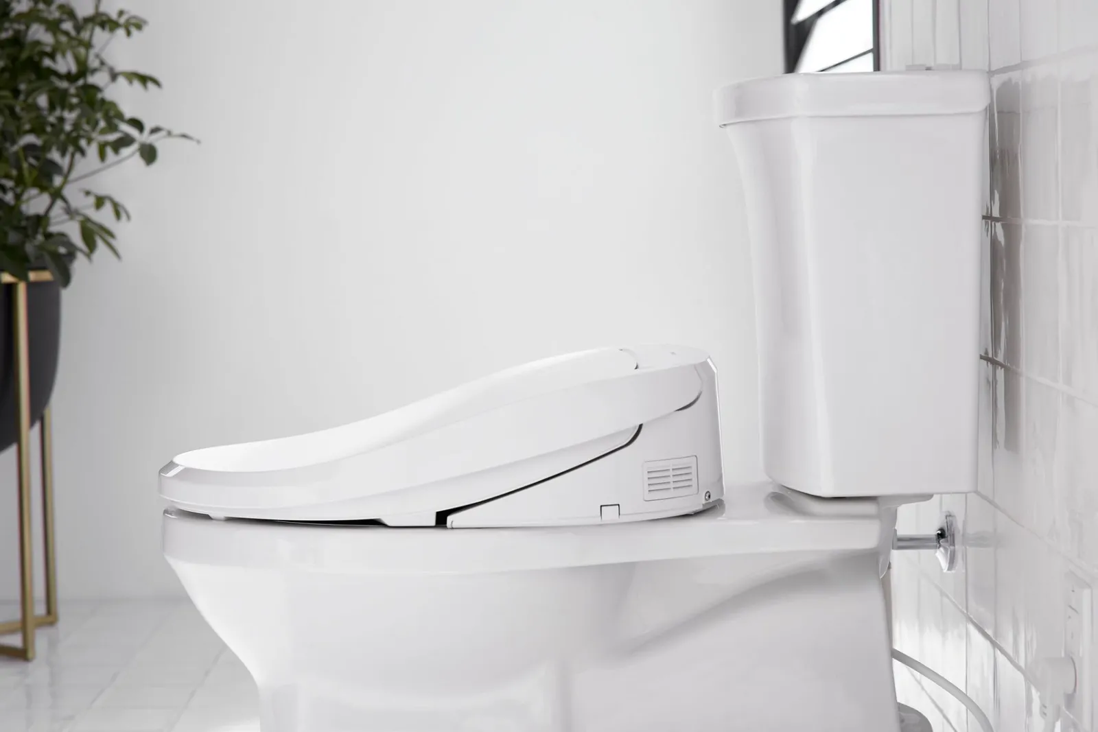 Elongated bidet toilet seat with remote control^Kohler Outlet