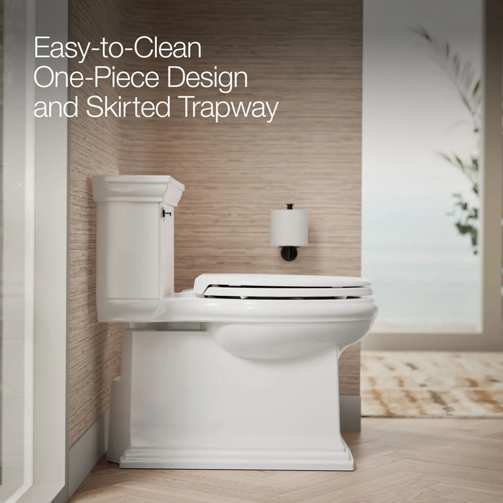 One-piece compact elongated toilet with skirted trapway, 1.28 gpf^Kohler Best