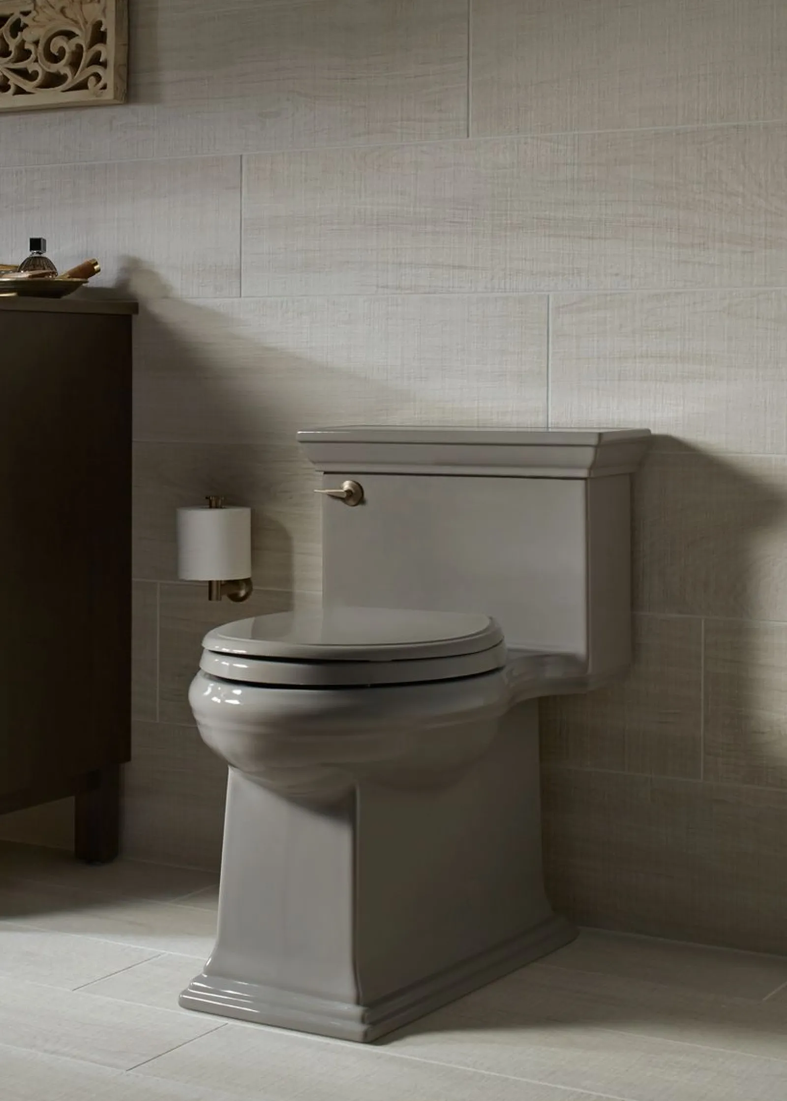 One-piece compact elongated toilet with skirted trapway, 1.28 gpf^Kohler Best