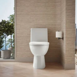One-piece compact elongated toilet with skirted trapway, 1.28 gpf^Kohler Best