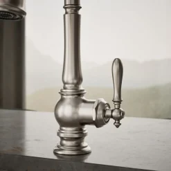 Pull-down kitchen sink faucet with three-function sprayhead^Kohler