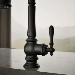 Pull-down kitchen sink faucet with three-function sprayhead^Kohler