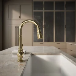 Pull-down kitchen sink faucet with three-function sprayhead^Kohler