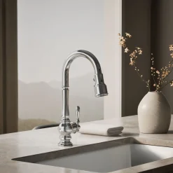 Pull-down kitchen sink faucet with three-function sprayhead^Kohler