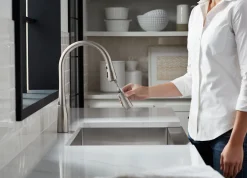 Pull-down kitchen sink faucet with three-function sprayhead^Kohler Clearance