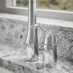 Pull-down kitchen sink faucet with three-function sprayhead^Kohler New