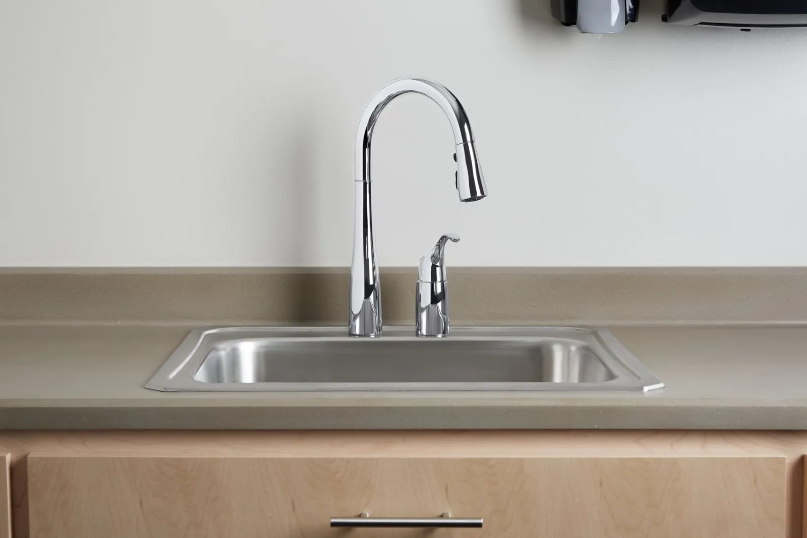 Pull-down kitchen sink faucet with three-function sprayhead^Kohler New