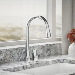 Pull-down kitchen sink faucet with three-function sprayhead^Kohler New