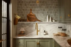 Pull-down kitchen sink faucet with three-function sprayhead^Kohler
