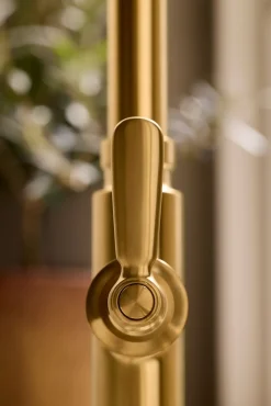 Pull-down kitchen sink faucet with three-function sprayhead^Kohler