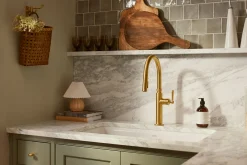 Pull-down kitchen sink faucet with three-function sprayhead^Kohler