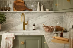 Pull-down kitchen sink faucet with three-function sprayhead^Kohler