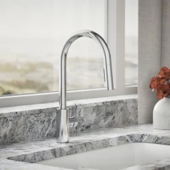 Pull-down kitchen sink faucet with two-function sprayhead^Kohler