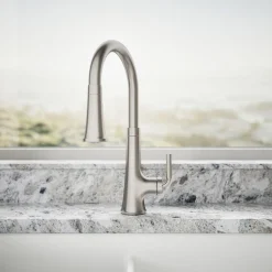 Pull-down kitchen sink faucet with three-function sprayhead^Kohler Hot