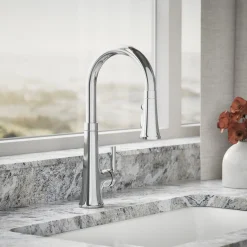 Pull-down kitchen sink faucet with three-function sprayhead^Kohler Hot