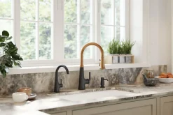 Pull-down kitchen sink faucet with three-function sprayhead^Kohler Hot