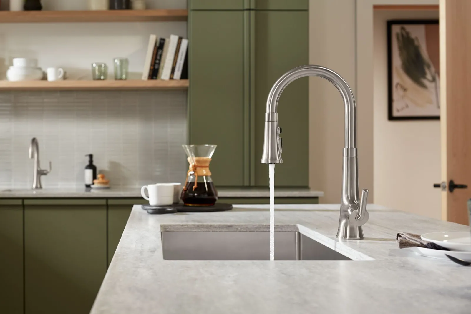 Pull-down kitchen sink faucet with three-function sprayhead^Kohler Hot