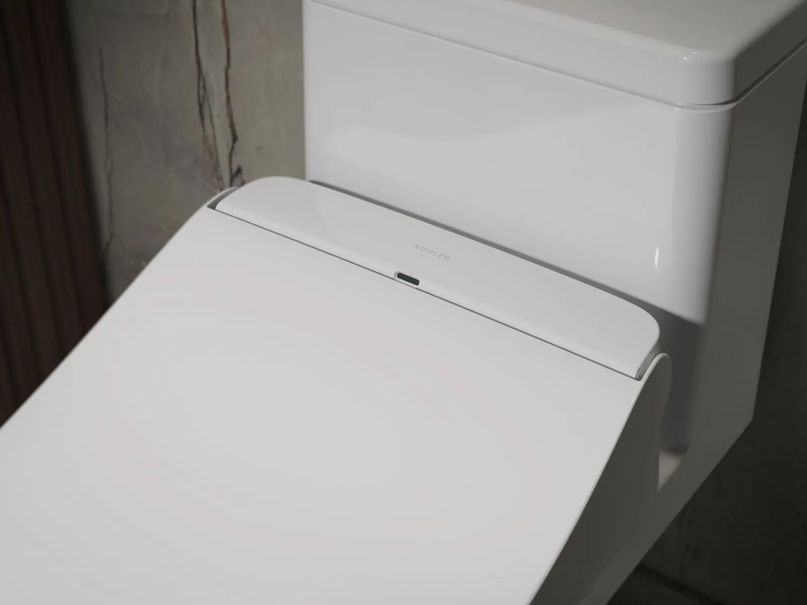 Round-front bidet toilet seat with remote control^Kohler Best