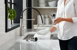 Semi-professional kitchen sink faucet with three-function sprayhead^Kohler Best