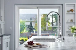 Semi-professional kitchen sink faucet with three-function sprayhead^Kohler