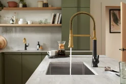 Semi-professional pull-down kitchen sink faucet with three-function sprayhead^Kohler Hot
