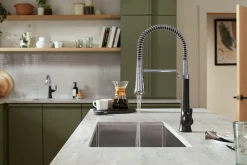 Semi-professional pull-down kitchen sink faucet with three-function sprayhead^Kohler Hot