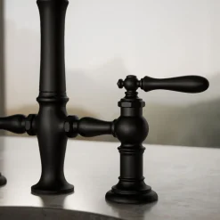 Three-hole bridge bar sink faucet with side sprayer^Kohler Outlet