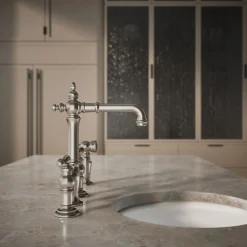 Three-hole bridge bar sink faucet with side sprayer^Kohler Outlet
