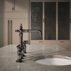 Three-hole bridge bar sink faucet with side sprayer^Kohler Outlet