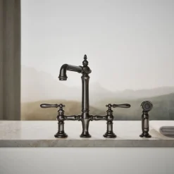 Three-hole bridge kitchen sink faucet with side sprayer^Kohler Outlet