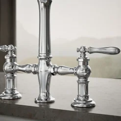Three-hole bridge kitchen sink faucet with side sprayer^Kohler Outlet