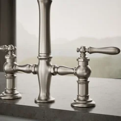 Three-hole bridge kitchen sink faucet with side sprayer^Kohler Outlet