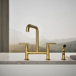 Two-hole bridge kitchen sink faucet with side sprayer^Kohler Hot