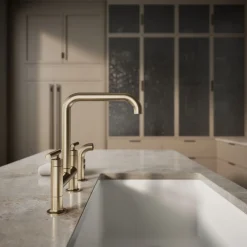 Two-hole bridge kitchen sink faucet with side sprayer^Kohler Hot