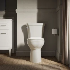 Two-piece elongated toilet, 1.28 gpf^Kohler Sale