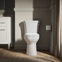 Two-piece elongated toilet, 1.28 gpf^Kohler Discount