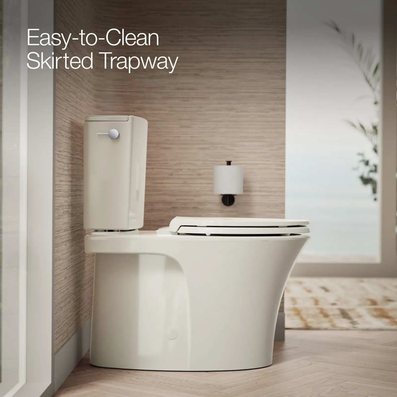 Two-piece elongated toilet with skirted trapway, 1.28 gpf^Kohler Hot
