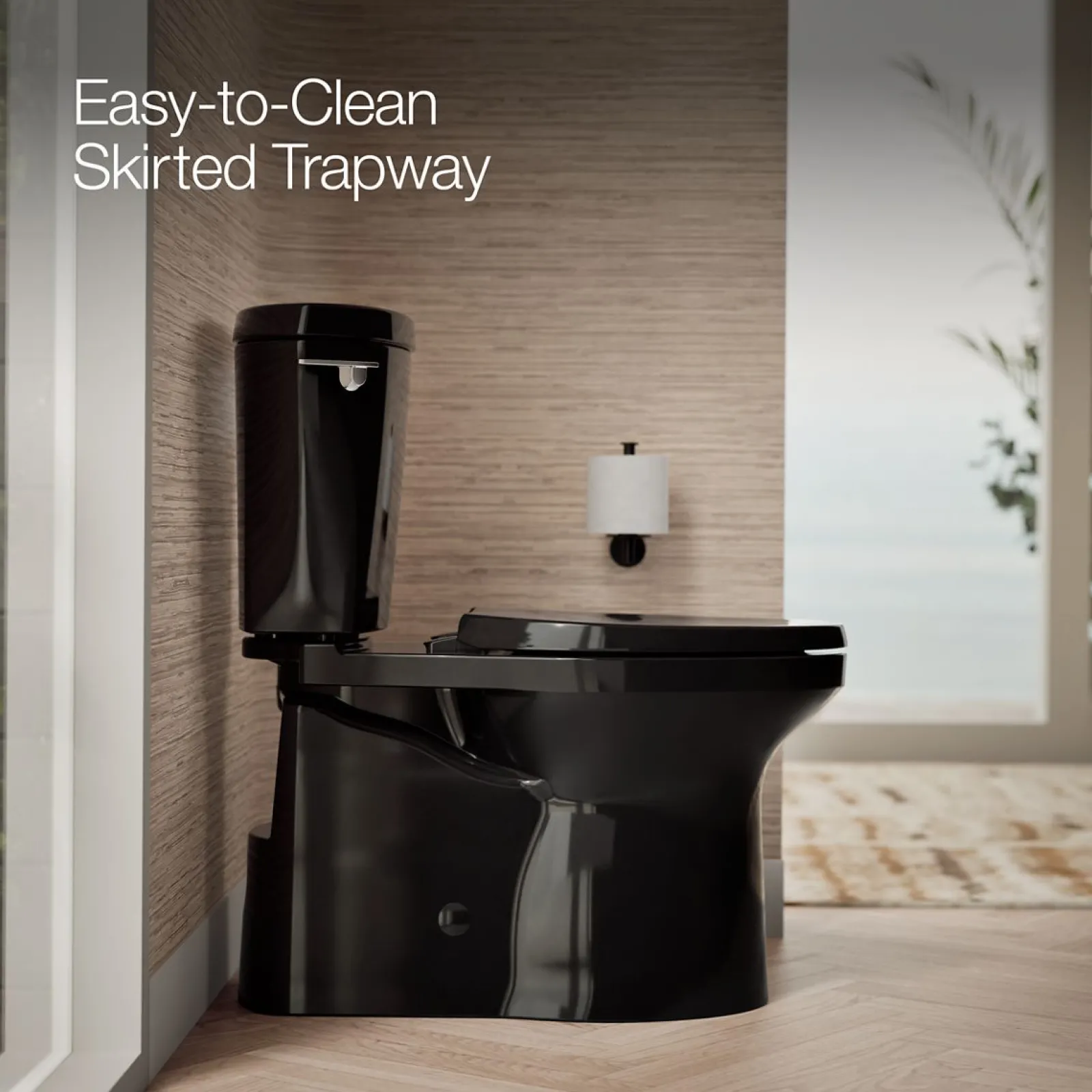 Two-piece elongated toilet with skirted trapway, 1.28 gpf^Kohler Clearance