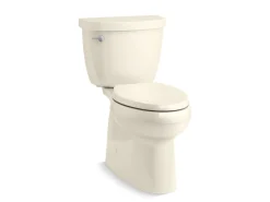 Two-piece elongated toilet with skirted trapway, 1.28 gpf^Kohler