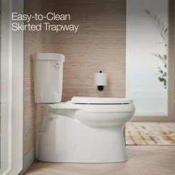 Two-piece elongated toilet with skirted trapway, 1.28 gpf^Kohler