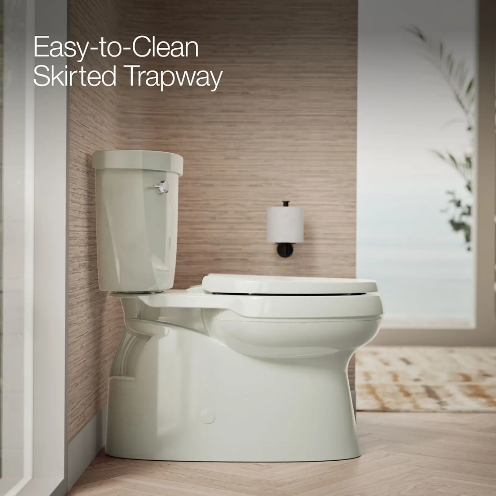 Two-piece elongated toilet with skirted trapway, 1.28 gpf^Kohler