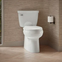 Two-piece elongated toilet with skirted trapway, 1.28 gpf^Kohler